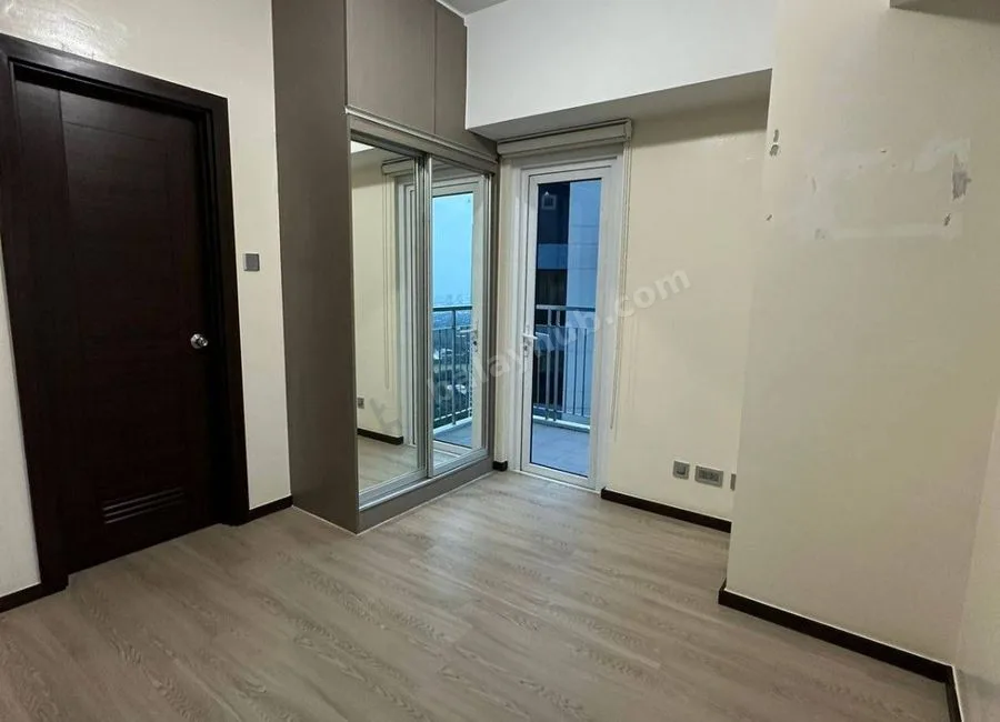 FOR LEASE: 102 SQM Flat in The Trion Towers, Taguig City