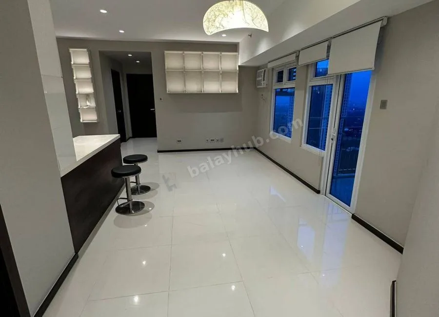 FOR LEASE: 102 SQM Flat in The Trion Towers, Taguig City