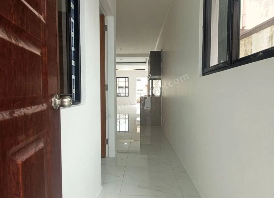 2 Carport Single Attached House and Lot for Sale in UPS 5 Village Paranaque 4 Bedrooms- JB