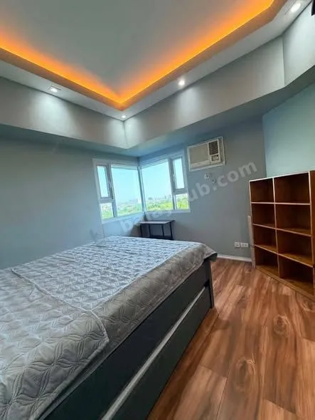 1BR Condo with Balcony at Trion Towers BGC